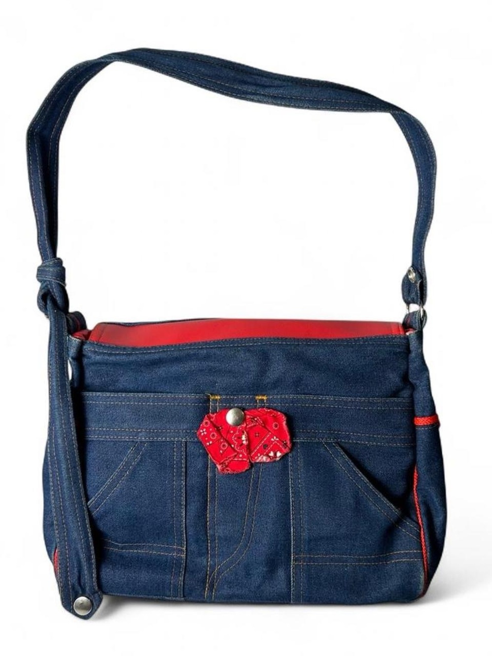 SAS navy denim crossbody bag with red accents